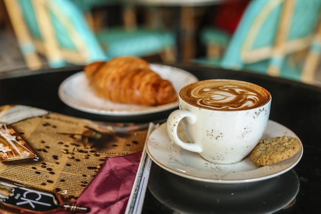 coffee-latter-with-cookies-croissant-side-view_141793-12170